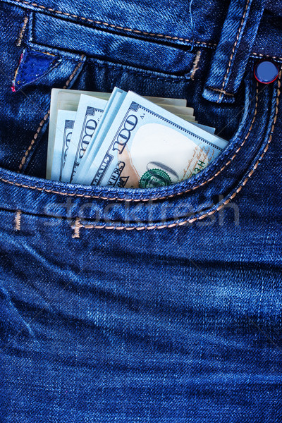 dollars in jeans pocket Stock photo © tycoon