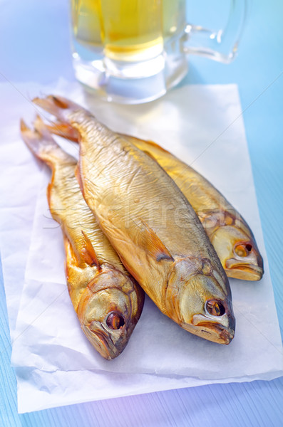 smoked fish with beer Stock photo © tycoon