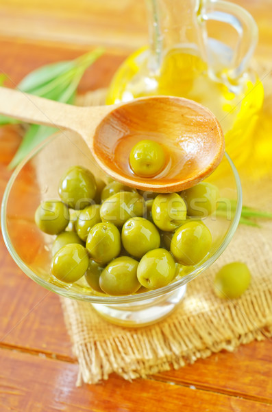 green olives and oil Stock photo © tycoon