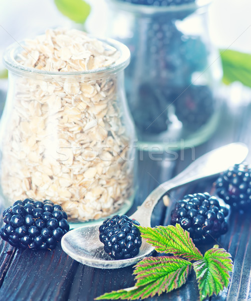 oat flakes with black berries  Stock photo © tycoon