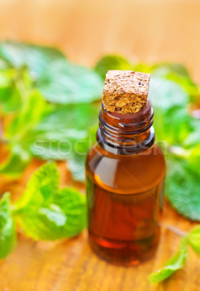 Aroma olie bloemen blad groene fles Stockfoto © tycoon