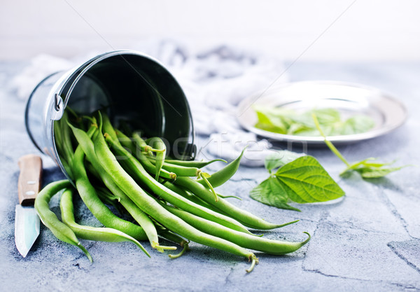 Zöldbab fém tányér asztal tavasz nyár Stock fotó © tycoon
