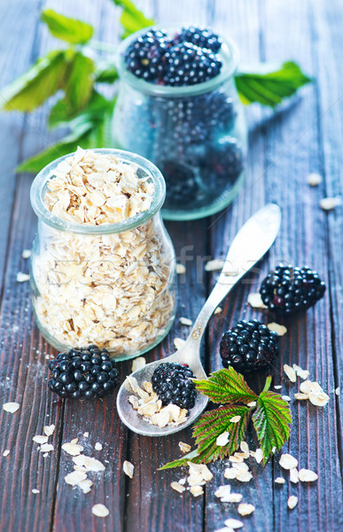 oat flakes with black berries  Stock photo © tycoon