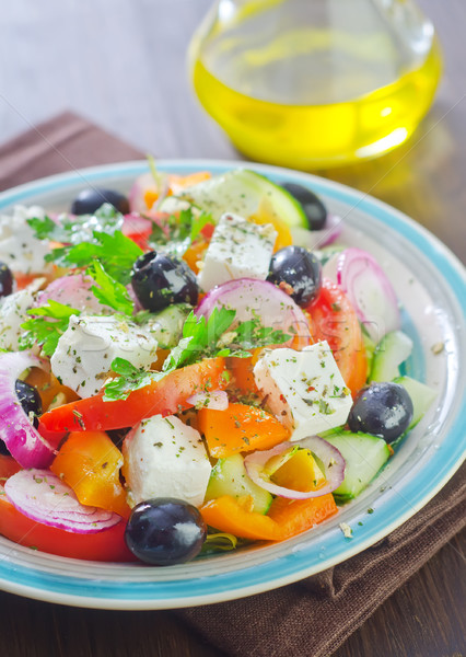 Grec salată fundal verde placă furculiţă Imagine de stoc © tycoon