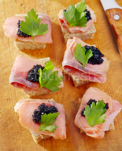 Stock photo: canape with fish and caviar