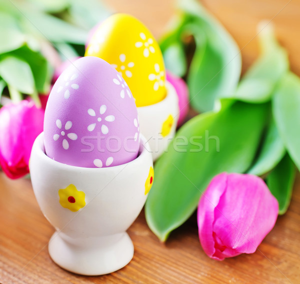 Pasen paaseieren houten tafel kleur eieren bloemen Stockfoto © tycoon