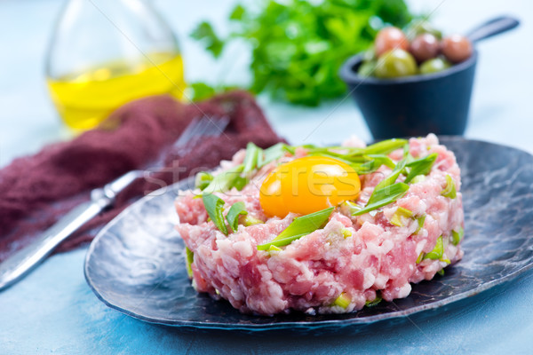 Carne especias crudo yema de huevo alimentos petróleo Foto stock © tycoon