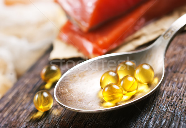 Peşte capsule untura de peste omega 3 alimente Imagine de stoc © tycoon