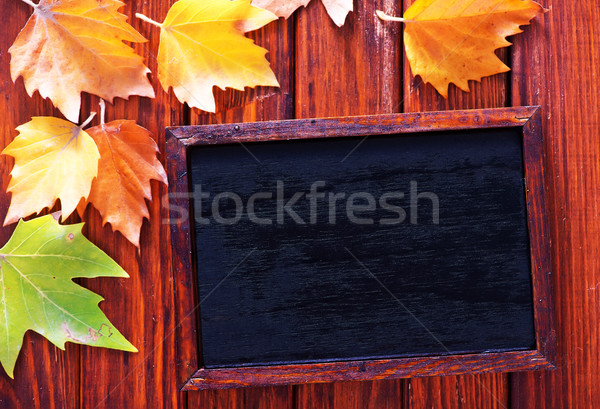 Outono amarelo folhas tabela madeira natureza Foto stock © tycoon