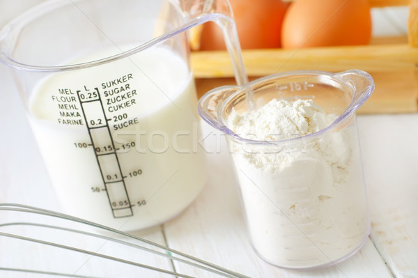 ingredients for dough, eggs, flour and milk Stock photo © tycoon