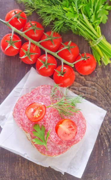 Stok fotoğraf: Sandviç · kırmızı · plaka · et · yağ · domates