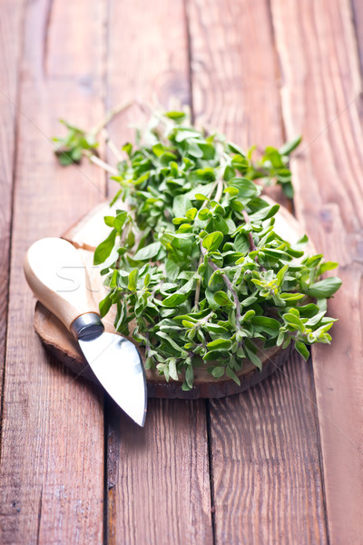 marjoram on a wooden rustic table Stock photo © tycoon