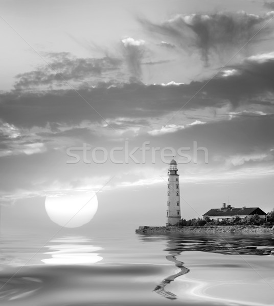 Vuurtoren strand hemel zon licht zee Stockfoto © tycoon