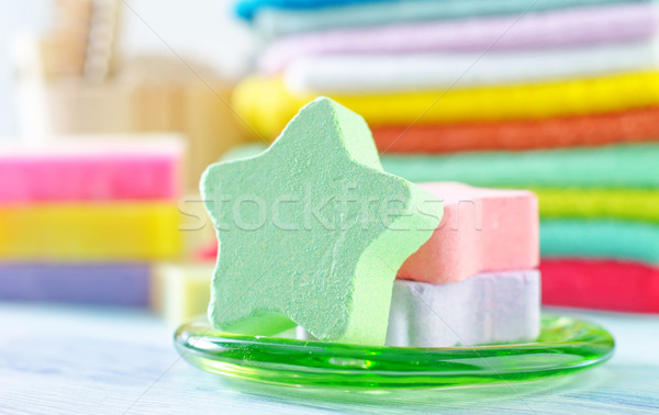 Assortment of soap and towels Stock photo © tycoon