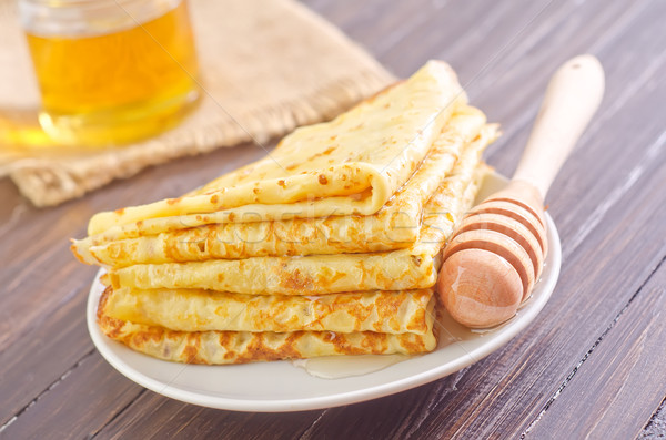 pancakes with honey Stock photo © tycoon