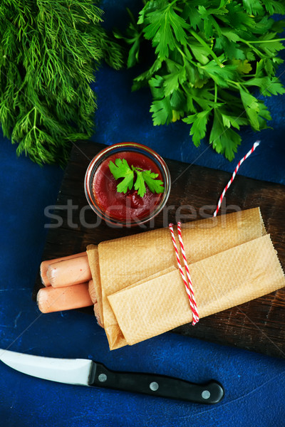 Salchichas frescos papel mesa alimentos cena Foto stock © tycoon