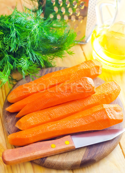 raw carrots and knife on the wooden board Stock photo © tycoon