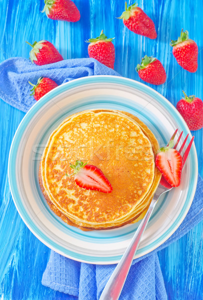 pancakes on plate and fresh strawberries Stock photo © tycoon