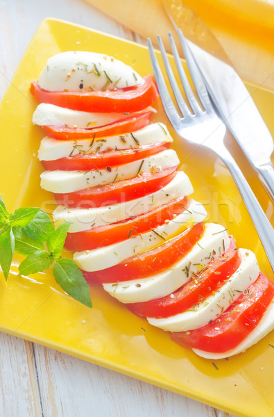 Caprese fresche insalata pomodoro mozzarella foglia Foto d'archivio © tycoon