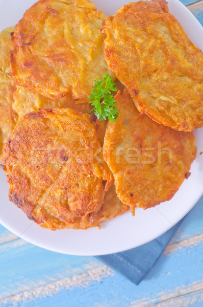 Stockfoto: Pannenkoeken · aardappel · keuken · diner · vork · eten