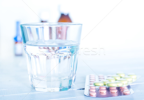 pills and water Stock photo © tycoon