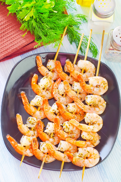 boiled shrimps are beaded on sticks Stock photo © tycoon
