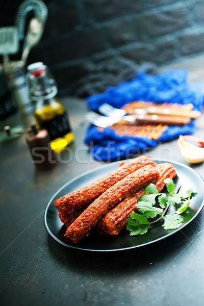 Worstjes zwarte plaat gerookt Spice voedsel Stockfoto © tycoon