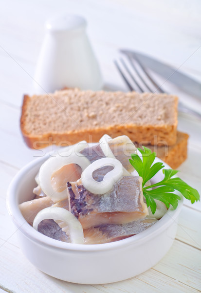 herring with onion and bread Stock photo © tycoon