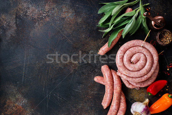 Saucisses brut épices table fond bleu [[stock_photo]] © tycoon