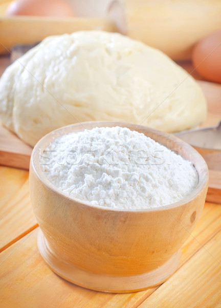 Flour in the wooden bowl Stock photo © tycoon