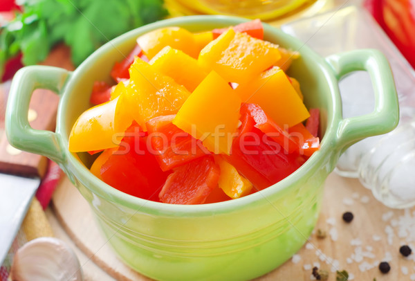 red and yellow peppers on wooden background Stock photo © tycoon