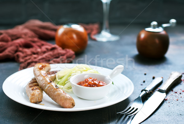 Sosis ızgara sos beyaz plaka restoran Stok fotoğraf © tycoon