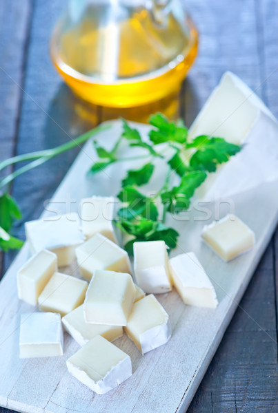 Camembert queso bordo mesa alimentos placa Foto stock © tycoon