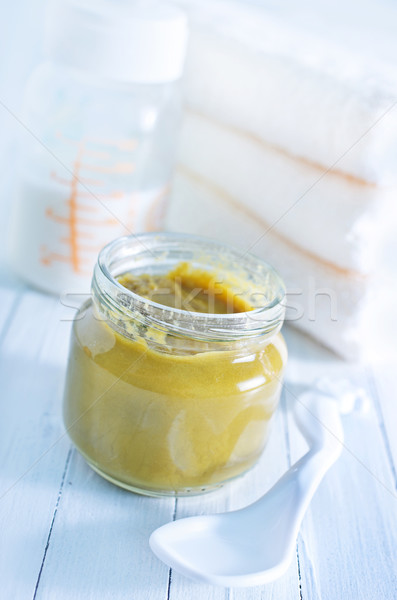 Alimentos para bebês criança laranja leite jantar cor Foto stock © tycoon