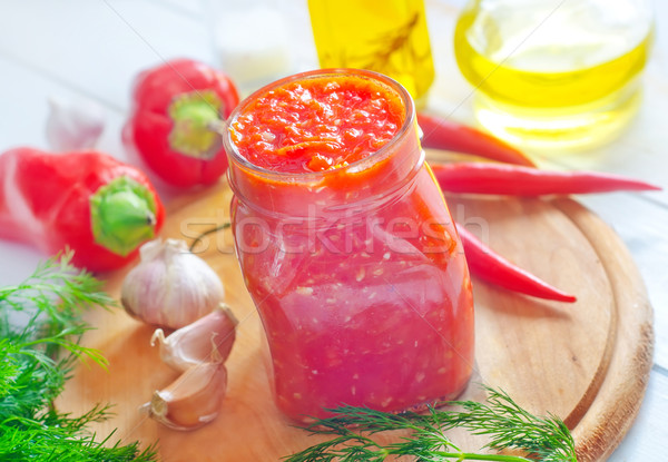 Fresh chilli sauce in the glass bank Stock photo © tycoon
