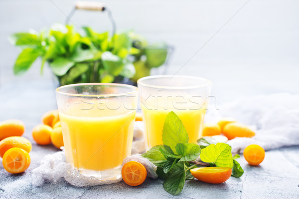 Jus verre table bois design orange [[stock_photo]] © tycoon