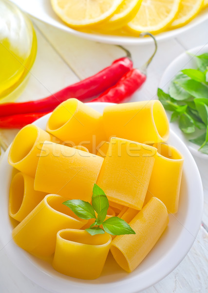 raw pasta with aroma spice and oil in the bottle Stock photo © tycoon