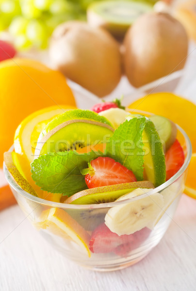 Gyümölcsök gyümölcs piros eper banán saláta Stock fotó © tycoon