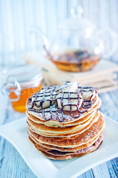 pancakes with banana and chocolate Stock photo © tycoon