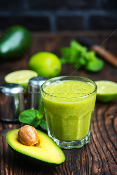 Periuta proaspăt avocado sticlă tabel fundal Imagine de stoc © tycoon