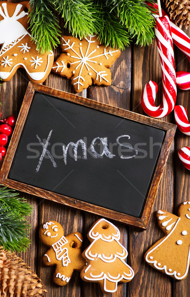 Gyömbér sütik karácsony asztal boldog háttér Stock fotó © tycoon