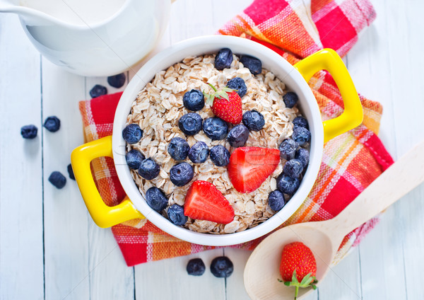 oat flakes with berries Stock photo © tycoon