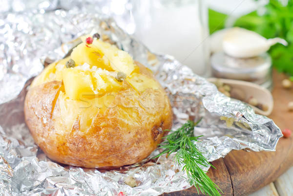 baked potato in foil Stock photo © tycoon