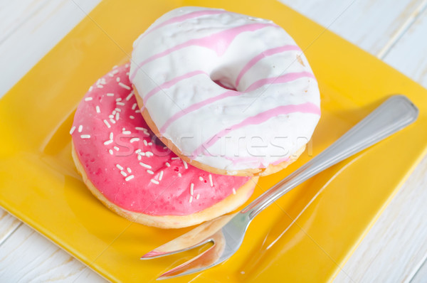 ストックフォト: ドーナツ · 色 · 朝食 · 脂肪 · ピンク · 甘い