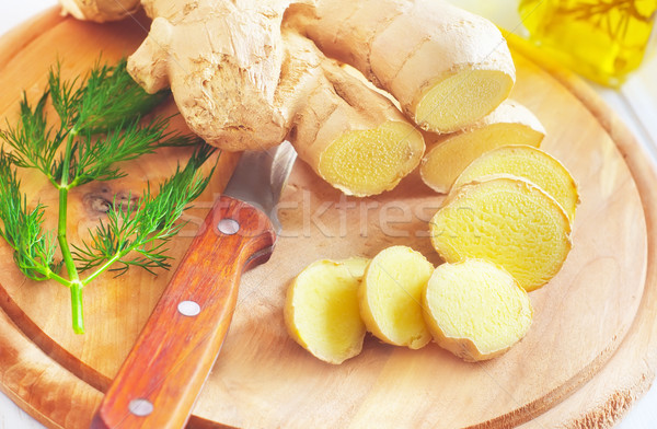 Fresh ginger and knife on the wooden board Stock photo © tycoon