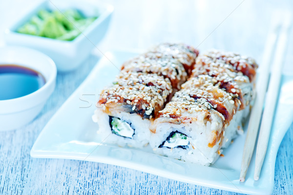 Frescos sushi placa mesa naranja negro Foto stock © tycoon