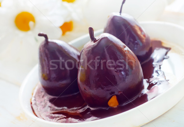 Păr ciocolată alimente dulce fruct fundal tabel Imagine de stoc © tycoon