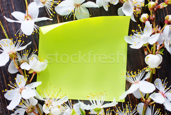 flowers and paper on wooden background Stock photo © tycoon