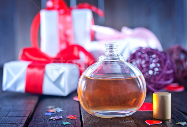 Parfum bouteille table en bois eau mode verre [[stock_photo]] © tycoon