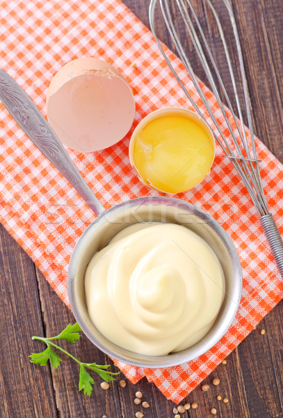 mayonnaise in metal spoon on wooden board Stock photo © tycoon